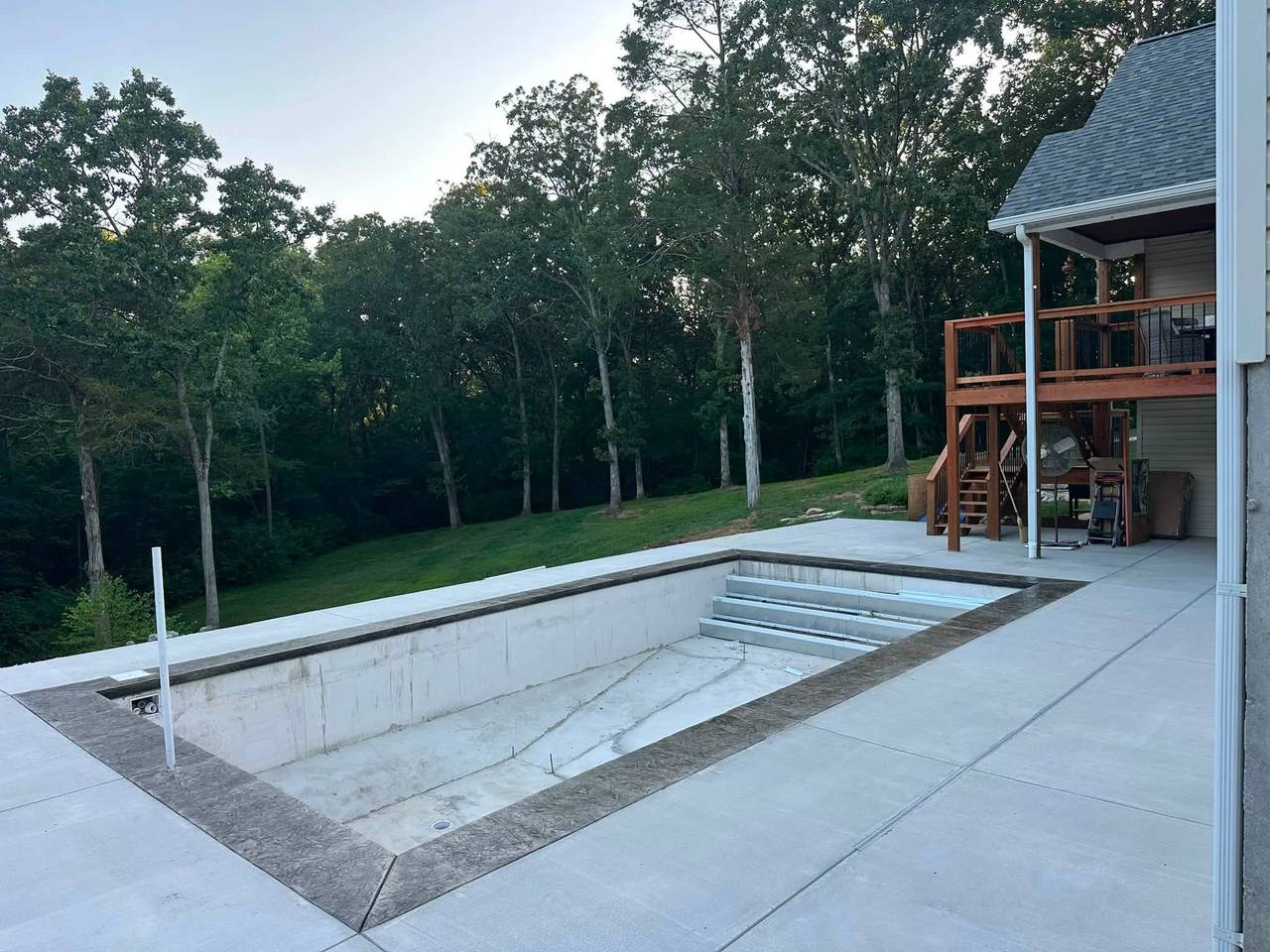 Pool with stamped coping and a fresh surround patio